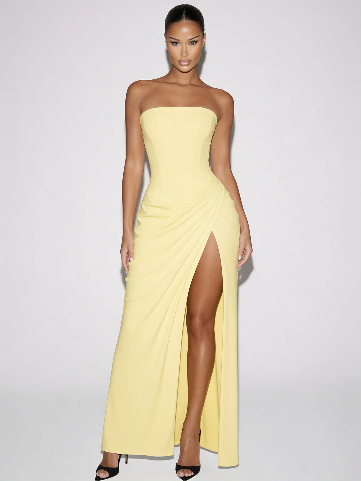 Aurelia butter yellow strapless corset maxi dress with draped skirt and thigh high slit