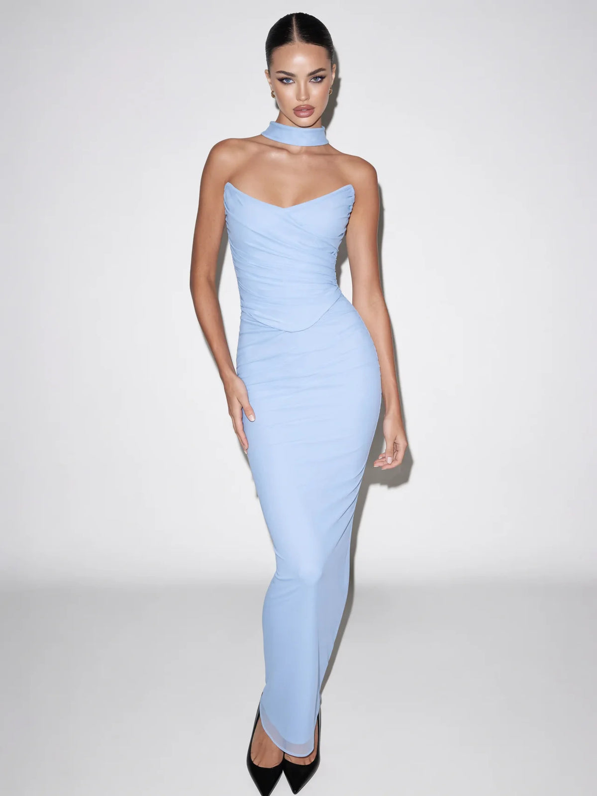Powder blue strapless maxi dress with sculpted ruched bodice and fitted skirt