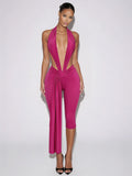 Samira fuchsia pink plunge halter jumpsuit with open sides and draped waist