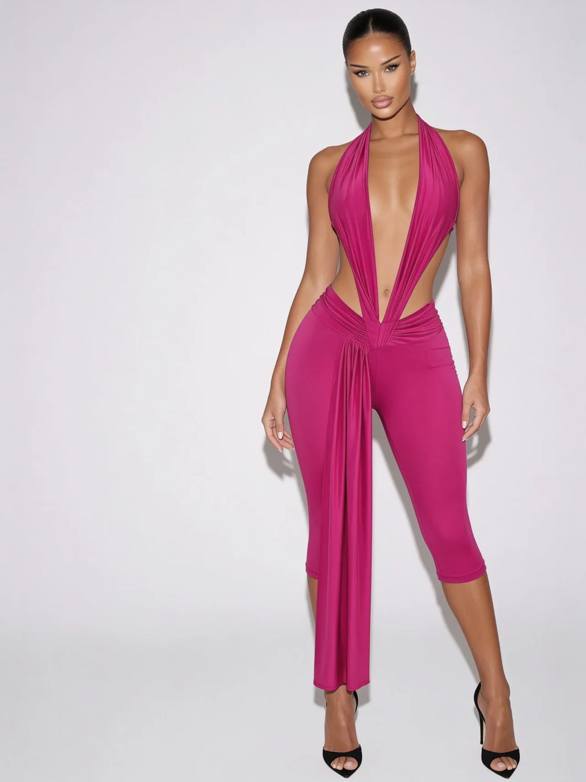 Samira fuchsia pink plunge halter jumpsuit with open sides and draped waist