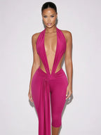 Samira fuchsia pink plunge halter jumpsuit with open sides and draped waist